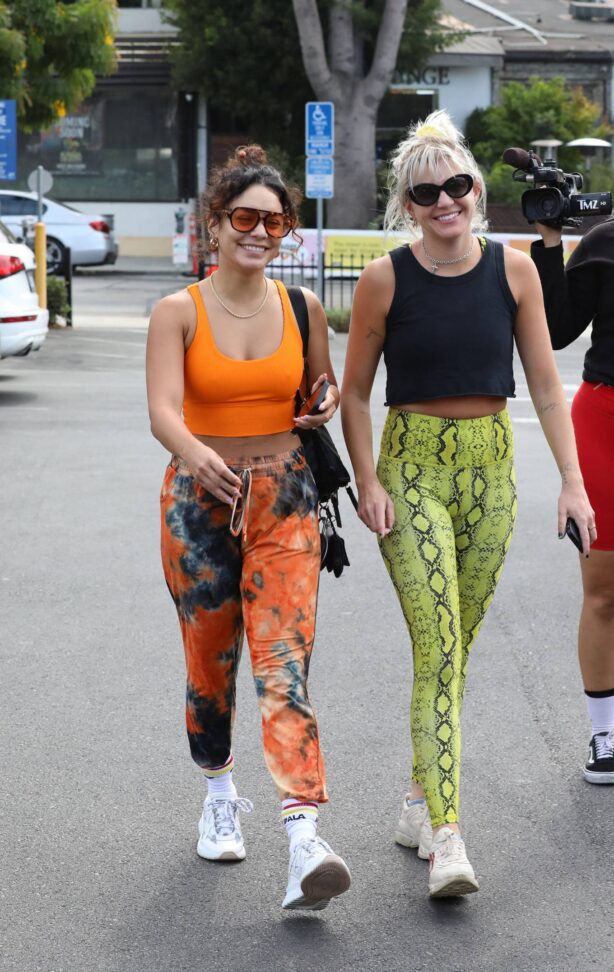 Vanessa Hudgens - Steps out in orange workout gear in West Hollywood