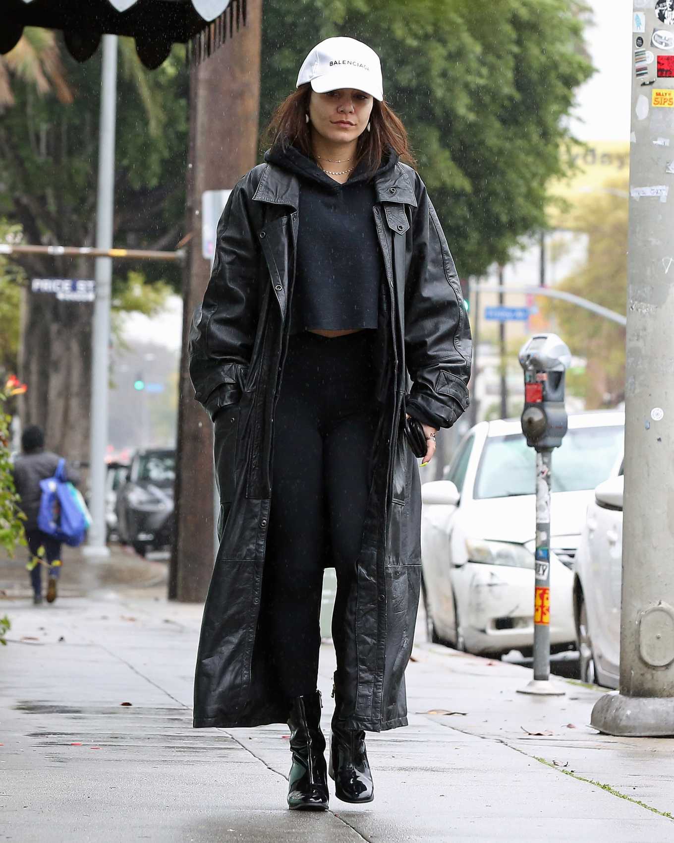 Vanessa Hudgens â€“ Wears a massive coat as she braves the rain in Los Angeles