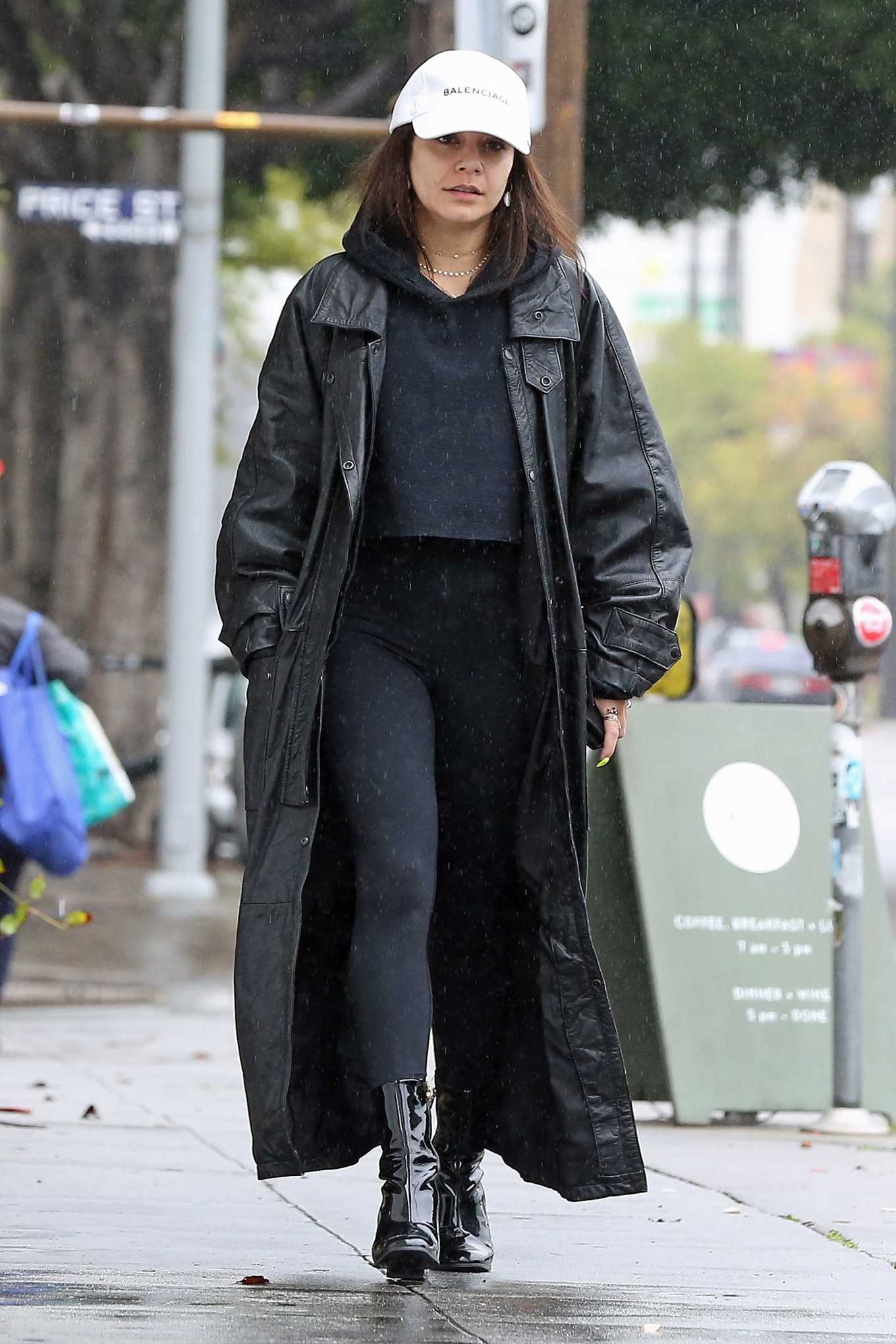 Vanessa Hudgens â€“ Wears a massive coat as she braves the rain in Los Angeles