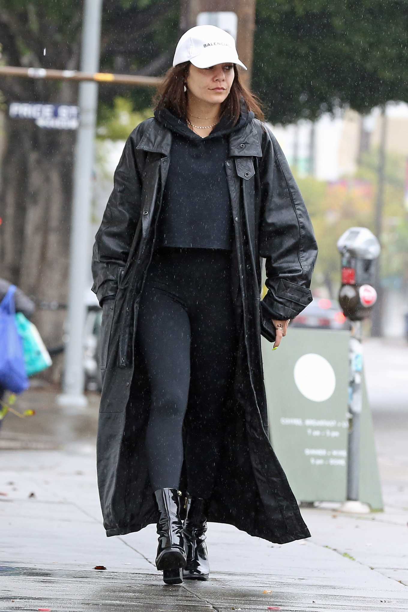 Vanessa Hudgens - Wears a massive coat as she braves the rain in Los ...