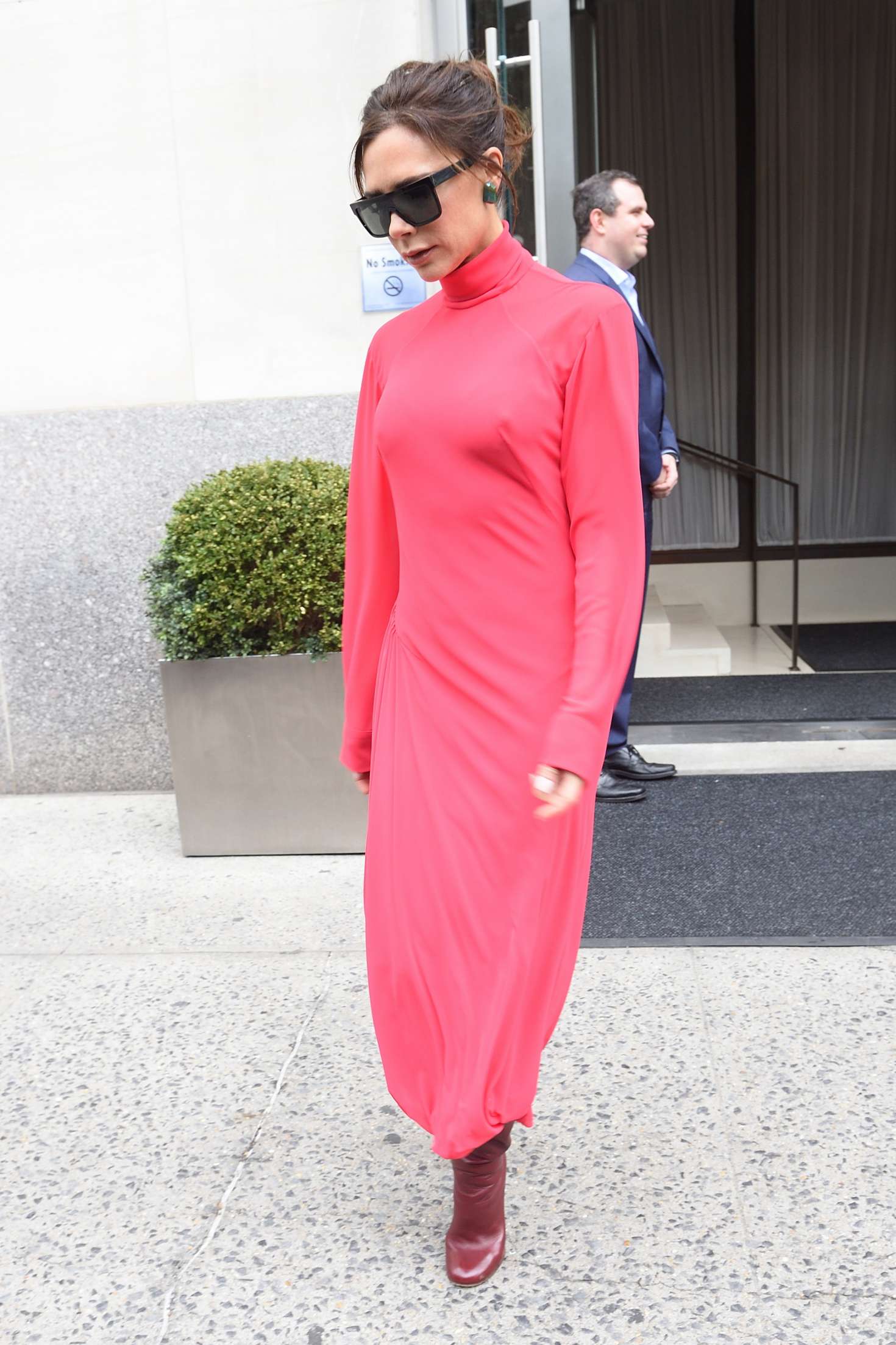 Victoria Beckham in red as she leaves her hotel -22 | GotCeleb