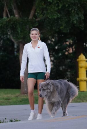 Victoria Iglesias - Takes her dog Luke for a stroll in Miami