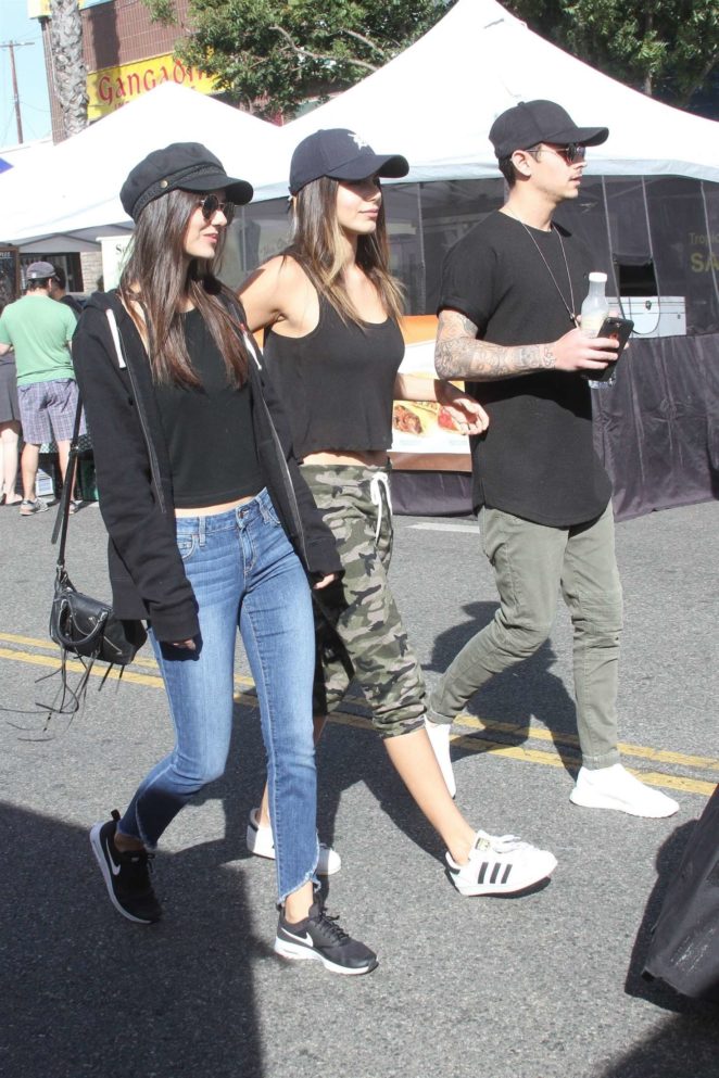 Victoria Justice and Madison Reed at the local farmer's market in Studio City
