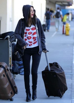 Victoria Justice - Arriving on a flight at LAX airport in Los Angeles