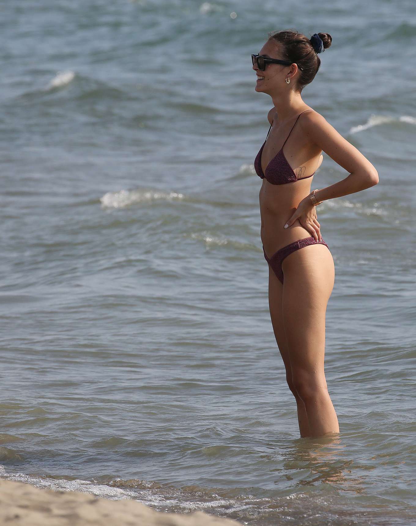 Vittoria Ceretti in Bikini on the beach in Forte dei Marmi. 