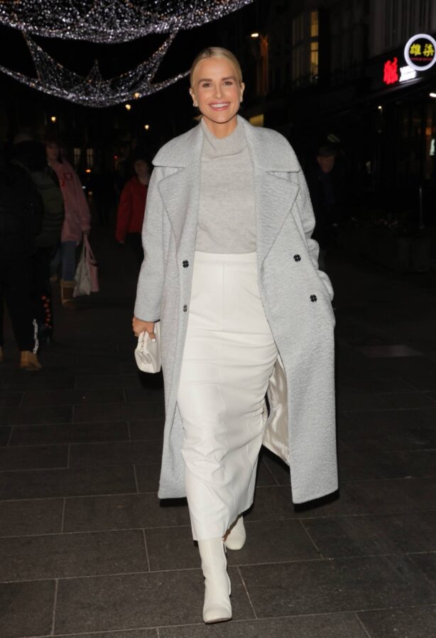 Vogue Williams - In a long white skirt and grey roll neck jumper at Heart radio in London
