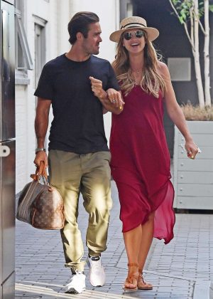 Vogue Williams in Red Dress with Spencer Matthews out in Chelsea Harbour