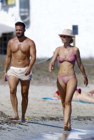 Vogue Williams - Spotted in a pink bikini on the Ibiza beach
