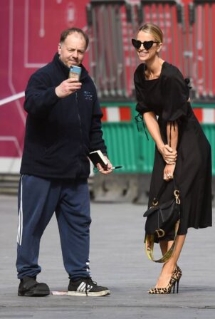 Vogue Williams - Takes a selfie with a fan in London