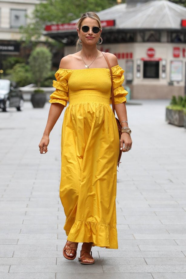 Vogue Williams - Wearing a yellow dress while arriving at Global Radio in London