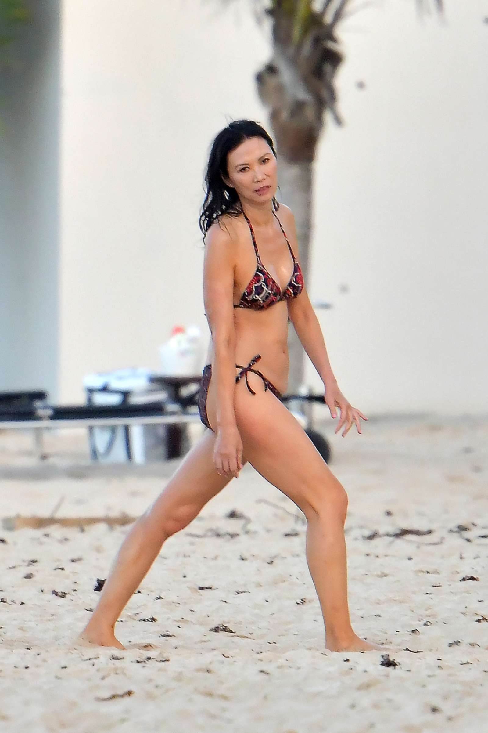 Wendi Deng Murdoch in Bikini on the beach in St. Barts. 
