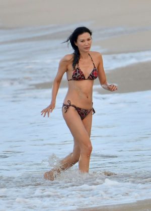 Wendi Deng Murdoch in Bikini on the beach in St. Barts