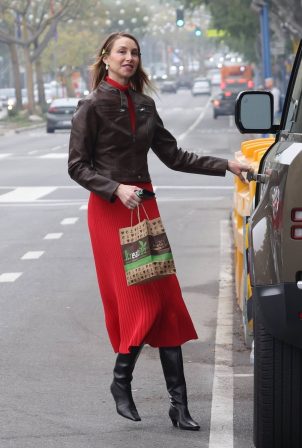 Whitney Port - Looking chic in a red dress and leather jacket