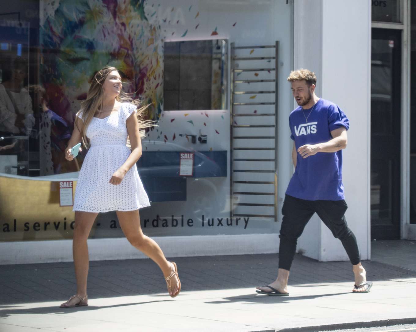Zara McDermott in White Mini Dress â€“ Shopping in London