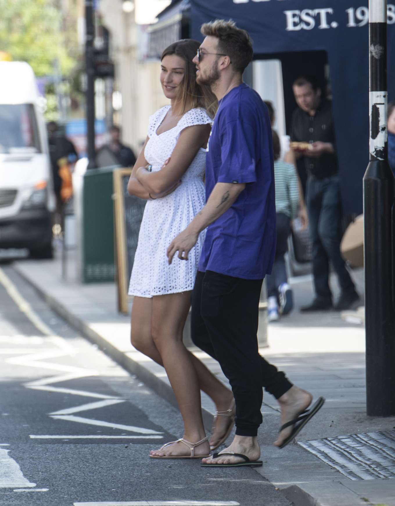Zara McDermott in White Mini Dress â€“ Shopping in London