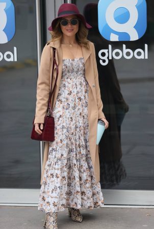 Zoe Hardman - In summer dress a print boots and burgundy hat in London
