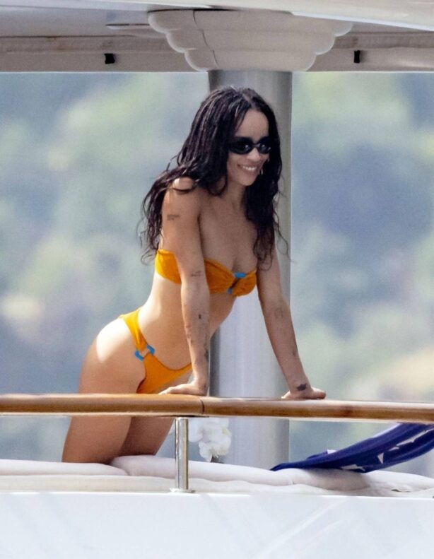 Zoe Kravitz - Spotted in orange bikini aboard a yacht in Positano - Italy