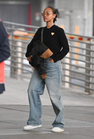 Zoe Saldana - Arriving at JFK airport in New York