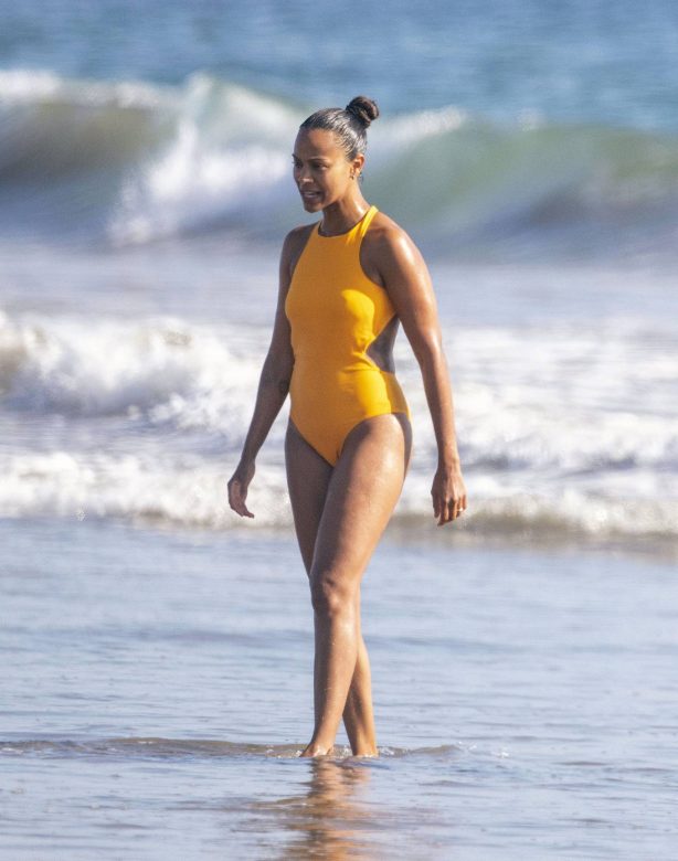 Zoe Saldana - In bikini on the beach in Malibu