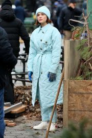 Zoey Deutch Wearing a baby blue full-length quilted coat on 'The Politician' set in NYC