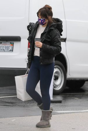 Zooey Deschanel - In a puffy jacket, navy leggings and UGG boots out in Brentwood