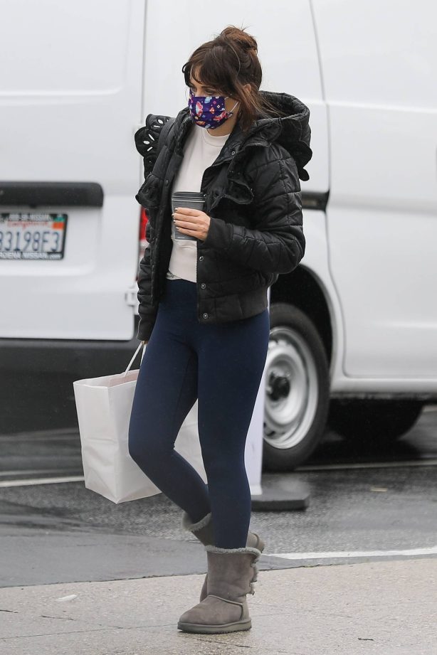 Zooey Deschanel - In a puffy jacket, navy leggings and UGG boots out in Brentwood