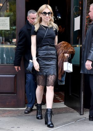 Zosia Mamet in a black leather skirt in New York City